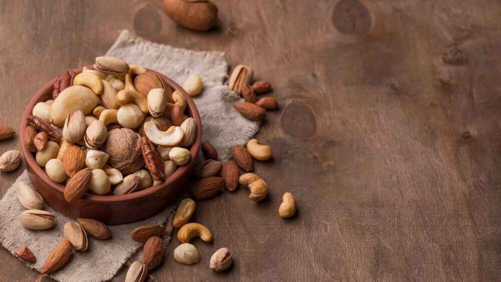 Bowl With Nuts Copy Space Wooden Background (1) (1) (1)